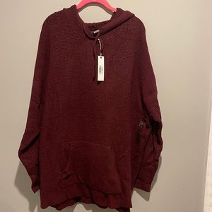 NWT Burgundy sweater with hood and pockets.